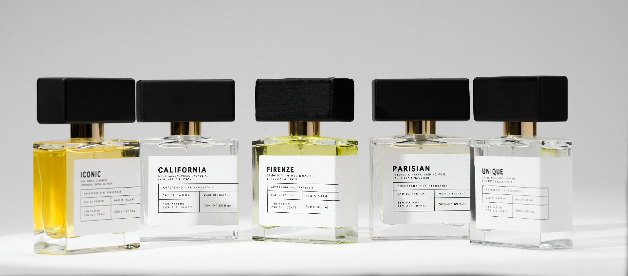 five fragrances lined up in a row 