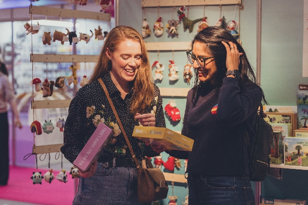 ladies discussing products at trade show